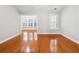 Neutral room with hardwood flooring, white trim and a window with views of greenery at 3317 Regent Sw Pl, Atlanta, GA 30311