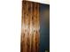 Modern accent wall featuring stained wood in a contemporary living room at 403 Red Oak Ln, Lawrenceville, GA 30046