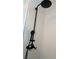 Black shower faucet with a hand-held wand and large rain-style shower head at 403 Red Oak Ln, Lawrenceville, GA 30046