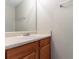 Bathroom with granite countertop, undermount sink, and a large mirror at 705 Brentwood Pkwy, Stockbridge, GA 30281