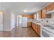 Spacious kitchen offering plenty of counter space, stainless steel appliances, and access to additional rooms at 705 Brentwood Pkwy, Stockbridge, GA 30281