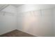 Empty walk-in closet with wire shelving and carpet flooring at 705 Brentwood Pkwy, Stockbridge, GA 30281