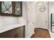 Kitchen area with hardwood floors adjacent to the foyer at 850 Piedmont Ne Ave # 1206, Atlanta, GA 30308