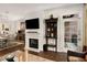 Cozy living room featuring a fireplace, stylish decor, and a doorway to the outside at 850 Piedmont Ne Ave # 1206, Atlanta, GA 30308