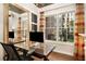 Office space with large mirror and view of the outdoors at 850 Piedmont Ne Ave # 1206, Atlanta, GA 30308