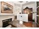 Elegant office space featuring a fireplace and view into the living area at 850 Piedmont Ne Ave # 1206, Atlanta, GA 30308