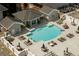 Aerial view of pool with a relaxing lounge-chair seating area at 850 Piedmont Ne Ave # 1206, Atlanta, GA 30308