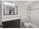Bathroom featuring granite countertop vanity, subway tile and shower at 1315 Old Coach Sw Rd, Marietta, GA 30008