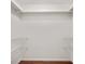 Empty closet with wire shelving and hardwood floors providing plenty of storage at 1315 Old Coach Sw Rd, Marietta, GA 30008