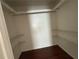 A walk-in closet with wire shelving to provide ample storage space at 1315 Old Coach Sw Rd, Marietta, GA 30008