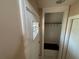 An entryway with a coat rack and a white door with a window pane at 1315 Old Coach Sw Rd, Marietta, GA 30008