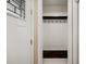 Clean entryway featuring a coat rack with hooks and storage bench at 1315 Old Coach Sw Rd, Marietta, GA 30008
