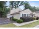 Charming townhouse with well-maintained landscaping and a neatly paved driveway at 1315 Old Coach Sw Rd, Marietta, GA 30008