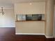 Kitchen view showcasing a breakfast bar that connects the space to the living room at 1315 Old Coach Sw Rd, Marietta, GA 30008