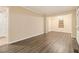 Spacious living room featuring stylish wood-look flooring and open layout at 1907 Oak Valley Rd, Decatur, GA 30035