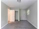 This gray bedroom has carpet, closet and a window letting in natural light at 1956 Joseph Ct, Decatur, GA 30032