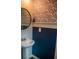 Stylish half-bath with modern wallpaper and pedestal sink at 284 Bryson Lake Cir, Douglasville, GA 30134
