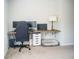 Bedroom with a minimalist workstation desk and a lamp at 284 Bryson Lake Cir, Douglasville, GA 30134