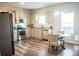 Contemporary kitchen with stainless steel appliances, granite countertops, white subway tile backsplash, and casual dining at 284 Bryson Lake Cir, Douglasville, GA 30134