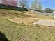 Spacious back yard is fenced for privacy, with a concrete patio perfect for grilling at 4192 Medlock River Ct, Snellville, GA 30039