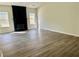 Bright and airy living room featuring new floors, fireplace, and high ceilings at 4192 Medlock River Ct, Snellville, GA 30039