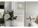 Bright bathroom featuring a soaking tub and a view of the outdoors at 1720 Barclay Close Nw, Atlanta, GA 30318