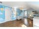 Bedroom room featuring a mural, chandelier, and hardwood floors at 1720 Barclay Close Nw, Atlanta, GA 30318