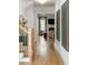 Inviting hallway featuring hardwood floors and views into the living room at 1720 Barclay Close Nw, Atlanta, GA 30318