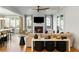 Open-concept living and dining area with hardwood floors and ample natural light at 1720 Barclay Close Nw, Atlanta, GA 30318
