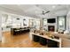 Open-concept living space with a modern kitchen, fireplace, and coffered ceilings at 1720 Barclay Close Nw, Atlanta, GA 30318
