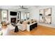 Spacious living room with a fireplace, contemporary furnishings, and access to the outdoors at 1720 Barclay Close Nw, Atlanta, GA 30318