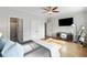 Spacious bedroom with hardwood floors, ensuite bathroom and a modern aesthetic at 1720 Barclay Close Nw, Atlanta, GA 30318