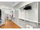 Spacious walk-in closet with custom shelving and hardwood floors at 1720 Barclay Close Nw, Atlanta, GA 30318