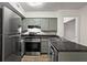 Well-equipped kitchen with stainless steel appliances and granite countertops at 1923 Brian Way # 1923, Decatur, GA 30033