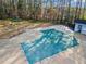 Aerial view of a covered swimming pool surrounded by lush trees at 1923 Brian Way # 1923, Decatur, GA 30033