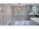 Bright dining area features marble floors, modern lighting, and stainless steel appliances at 3340 Brenda Ln, Lithia Springs, GA 30122
