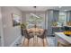 Cozy dining area featuring modern lighting and ample natural light at 3340 Brenda Ln, Lithia Springs, GA 30122
