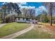 A charming single-Gathering home with a well-manicured lawn and brick exterior at 3340 Brenda Ln, Lithia Springs, GA 30122