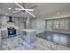 Open floor plan with a spacious kitchen including stainless steel appliances and white countertops at 3340 Brenda Ln, Lithia Springs, GA 30122