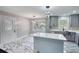 Well-lit kitchen with an island and stainless steel appliances at 3340 Brenda Ln, Lithia Springs, GA 30122
