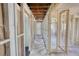 Unfinished room interior with wooden frame construction and a concrete floor at 3340 Brenda Ln, Lithia Springs, GA 30122