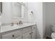 Clean half-bath with white vanity, bronze hardware, and modern fixtures at 3897 Beacon St, Marietta, GA 30062