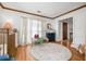 Bright Bedroom features hardwood floors, colorful decor, and lots of natural light at 3897 Beacon St, Marietta, GA 30062