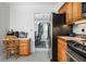 Bright kitchen features an eat-in desk, stainless steel appliances, and an open view into the dining area at 3897 Beacon St, Marietta, GA 30062