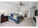 A spacious primary bedroom featuring large windows and an ensuite bath is a calming retreat within the home at 3897 Beacon St, Marietta, GA 30062