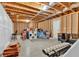 Unfinished basement with exposed beams, offering potential for customization and additional living space at 359 Woodridge Pass, Canton, GA 30114