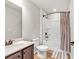 Cozy bathroom featuring a shower-tub combination, toilet, and vanity with a granite countertop at 359 Woodridge Pass, Canton, GA 30114
