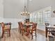 Elegant dining area with a chandelier and many windows at 359 Woodridge Pass, Canton, GA 30114