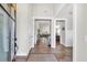 Bright foyer with hardwood floors leading to the living spaces at 359 Woodridge Pass, Canton, GA 30114