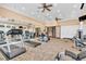 The gym features fitness equipment, ceiling fans and mirrors at 359 Woodridge Pass, Canton, GA 30114